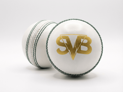 Pair of SVB white cricket balls showing gold logo